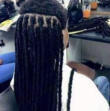 Long single fishbone dreadlock with wrap. I Do Artificial Dreadlocks In Pretoria Town Pretoriues And Central African Hair Braiding Styles African Braids Hairstyles Pictures Braids Hairstyles Pictures