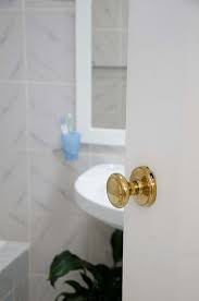 Insert a very thin screwdriver into the hole in the middle of the . How To Replace Your Door Handle Better Homes And Gardens