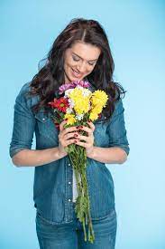 Check spelling or type a new query. Portrait Of Happy Woman Holding Flowers In Studio Isolated On Blue Free Stock Photo And Image