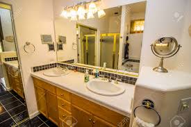 master bedroom bathroom with dual sinks