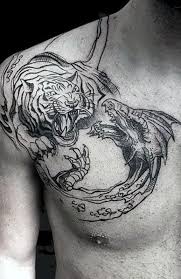 What does a tiger tattoo symbolize? 20 Powerful Dragon Tattoo For Men In 2021 The Trend Spotter