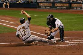 Just behind home plate, paint a small box where the catcher and umpire (an impartial judge) will squat or stand and home runs are fun, but not common enough to be relied upon as a means of winning the game. Blocking The Plate Wikipedia