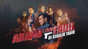 Fadil tidak mahu lagi masuk campur dalam dunia gengster dan mahu bebas dari geng shark, tetapi dia perlu melaksanakan satu tugasan terakhir sebagai hadiah untuk layak. Di Sebalik Tabir Filem Abang Long Fadil Youtube