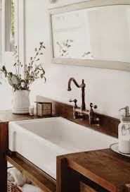 Distinguished by their exposed front that drops down to the cabinet below rather. Wood Countertop Vanity Top Rustic Vanity Utility Sink Farmhouse Apron Sink I Would Love To H Bathrooms Remodel Farmhouse Bathroom Decor Bathroom Inspiration