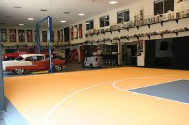 Indoor Basketball Court In A Large Warehouse Type Garage Basketball Court Basketball Indoor Basketball Court