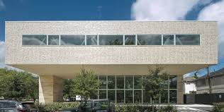 Buy real estate and wait …. Dillion Kyle Architects Select Accoya For Entire Facade North America
