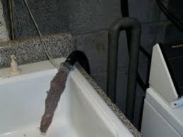 relocating washing machine drain hose