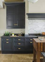 Does your kitchen have black appliances? Dark Grey Kitchen Cabinetry Satin Brass Hardware Marble Backsplash Dark Grey Kitchen Kitchen Design Grey Kitchen Designs