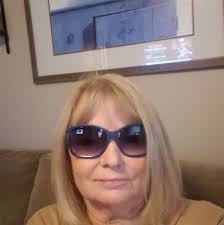 What are some beachfront hotel recommendations in Cape May for a family  with 2 adults and 2 children?