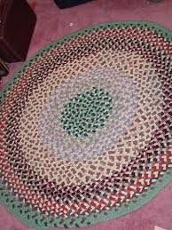 Husbands Rug I Made It For Him Braided Rug Diy Braided Rug Tutorial Braided Rag Rugs To make an oval rug, start your braids off at a length that is the difference between the width and 10. braided rug tutorial braided rag rugs