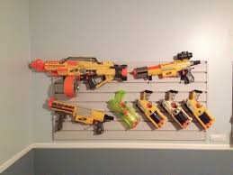 Mount the pegboard to the wall with mounting screws or anchors. Use Slatboard To Store Your Nerf Guns Offbeat Home Life