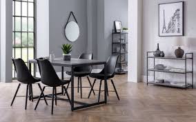 A neat and functional, space saving dining set where the chairs can be folded and stored inside the table. Staten Kari Black Dining Set Julian Bowen Limited
