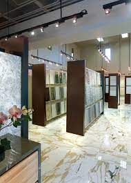 Opustone Ft Lauderdale Showroom With Paonazzo Marble Floors Opustone Marble Naturalstone St Showroom Design Showroom Interior Design Tile Showroom Design