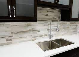 The inconsistent geometric pattern is extremely unique and looks great in this setting. 75 Kitchen Backsplash Ideas For 2021 Tile Glass Metal Etc Kitchen Backsplash Designs Modern Kitchen Backsplash Modern Kitchen Tiles