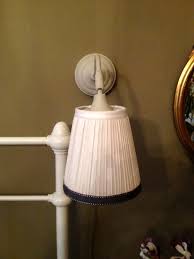 I really wanted to do a pair of lamps, but with only one nightstand that wasn't really an option. Countrified And Shabbified Wall Lights Ikea Hackers