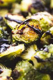 This Easy Roasted Brussels Sprouts With Parmesan And Balsamic Recipe Is Tasty Enough To Roasted Brussel Sprouts Brussel Sprout Recipes Roasted Roasted Brussel