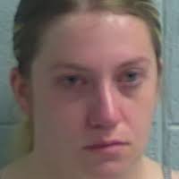 2 police officers arrested in murder case