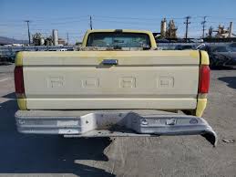 Image result for Bright Yellow 1990 Truck