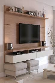 Looking to replace my entertainment center with one that mounts to the wall. Vienna Floating Entertainment Center Roolee
