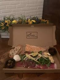 Owner Al Buchanan (left) enjoying a selection of new wines