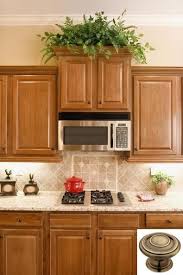 Dark Light Oak Maple Cherry Cabinetry And Wood Kitchen Cabinets At Lowes Check The Pin For Above Kitchen Cabinets Honey Oak Cabinets Kitchen Wall Colors