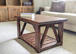 A table, a bed, and a chair: Diy Coffee Table With Truss Sides