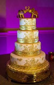 Two white and one red satellite cakes with the dragon and phoenix embroidery on the bottom red tier. Elephant Birthday Cake Ideas Novocom Top