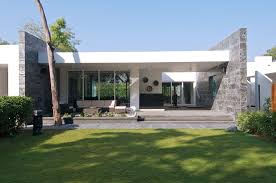 This modern house plan collection has designs with spacious interiors and large windows, perfect for letting in sunlight and clear sightlines for great views. Dinesh Mills Bungalow Atelier Design N Domain House Designs Exterior Modern House Exterior Facade House