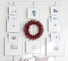 Why pay for a rustic look that you can make for yourself on the cheap? Hanging Picture Frame Rail White Pottery Barn