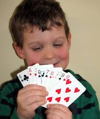 A fan tan game in progress. Play Slapjack Card Game With Kids