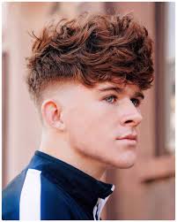This layered haircut creates a nice wavy motion in the hair, ideal for naturally curly or wavy hair types. The 22 Best Haircuts For Teenage Boys For 2021