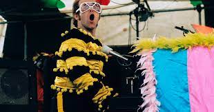 Rocketman elton john outfit cosplay costume complete white braces halloween suit. A Visual History Of Elton John S Flashiest Larger Than Life Looks