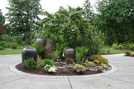 You have the option of turning it into a courtyard driveway by putting something in the middle like a fountain or garden. Driveway Landscaping Landscaping Network