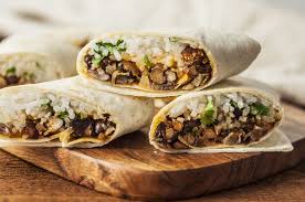 A Bean And Rice Burrito Is Great With Fixings Recipe Bean And Cheese Burrito Burritos Recipe Healthy Beans