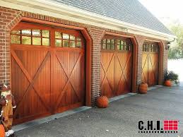 Mahogany Overlay Carriage Door Carriage Garage Doors For Atlanta Ga Garage Door Styles Wooden Garage Doors Garage Doors