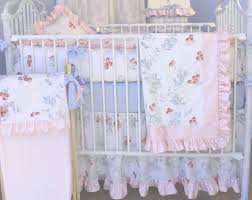 Quilt, bumper, dust ruffle, fitted sheet, diaper stacker, and valance. Blueberrie Kids Cherry Blossom 3 Piece Crib Bedding Set Wayfair
