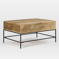 Consider buying two with a west elm coffee table, so you can create the ultimate breakfast space to sip your morning brew and read the newspaper (tablet or print). Industrial Storage Coffee Table Small Raw Mango West Elm Havenly