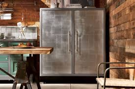 Their manufacturers generally offer matching spacers, or filler boards that are used to fill in gaps at the end of cabinet runs. Metal Kitchen Cabinets Advantages And Disadvantages Of Stainless Steel