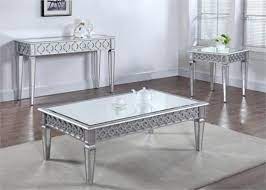 This modern coffee table in a set of 2 is designed with an elegant rounded metal frame and a genuine marble top that creates a welcoming feeling and provides ample space to put drinks or decor on top. Silver Mirror Coffee Table And Sofa Table