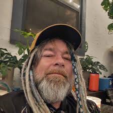 A naked man skating down an Ohio freeway in a panda head and carrying what  appears to be a golf club has gone viral