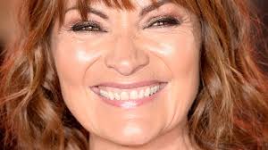 Lorraine Kelly's outfit from the Lorraine show: where is her orange striped  jumper with white stripes from?