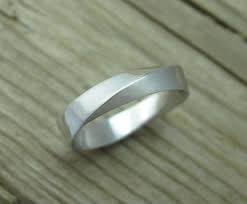 This is a great thing because our customers are very creative and make wonderful designs. Mobius Wedding Band 5mm Mens White Gold Wedding Ring Benati