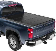 Combined with a locking truck bed cover, a hard folding tonneau provides complete security to your payload. Amazon Com Gator Fx Hard Quad Fold Truck Bed Tonneau Cover 8828131 Fits 2019 2021 Chevy Gm Silverado Sierra Works With Multipro Flex Tailgate 6 7 Bed 79 4 Automotive