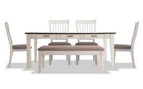 Many of our memories of childhood revolve around the kitchen table. Montana 6 Piece Dining Set With Storage Bench Bob S Discount Furniture