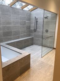 This contemporary spa bath features a chrome kohler ceiling mounted rain shower head, handheld, and multiple body sprays. Contemporary Bathroom Design Ideas Every Bathroom Remodel Starts With A Design C Master Bathroom Design Contemporary Bathroom Designs Bathroom Interior Design