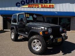 Image result for Brilliant Black 2003 Jeep