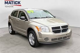 Image result for Sunburst Orange 2009 Caliber