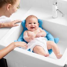 It is safer to bathe a young infant in the sink, where mom can handle the infant with one hand, or fill a baby bath. Mini Me Erbil Skip Hop Moby Hotspot Sink Bather Is The Easiest Way To Bath Your Newborn Baby It Fits Most Kitchen And Bathroom Sinks Whale Shape Is Perfectly