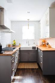 A premium look & feel to your kitchen without the premium prices. A Clean Classic 1920s Michigan Home Galley Kitchen Design Budget Kitchen Remodel Kitchen Layout