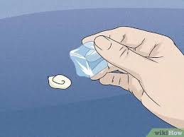 Basuh permukaan kereta dengan air biasa, hilangkan kotoran yang kasar. How To Remove Chewing Gum From A Car Exterior 9 Steps